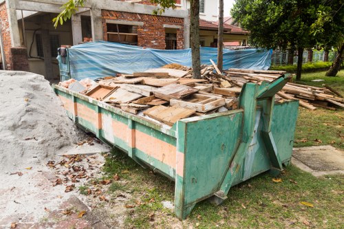 Before and after garden clearance in a Greenwich backyard