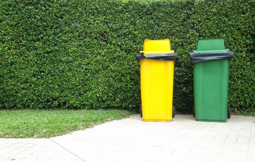 Recycling bins and sorted waste materials
